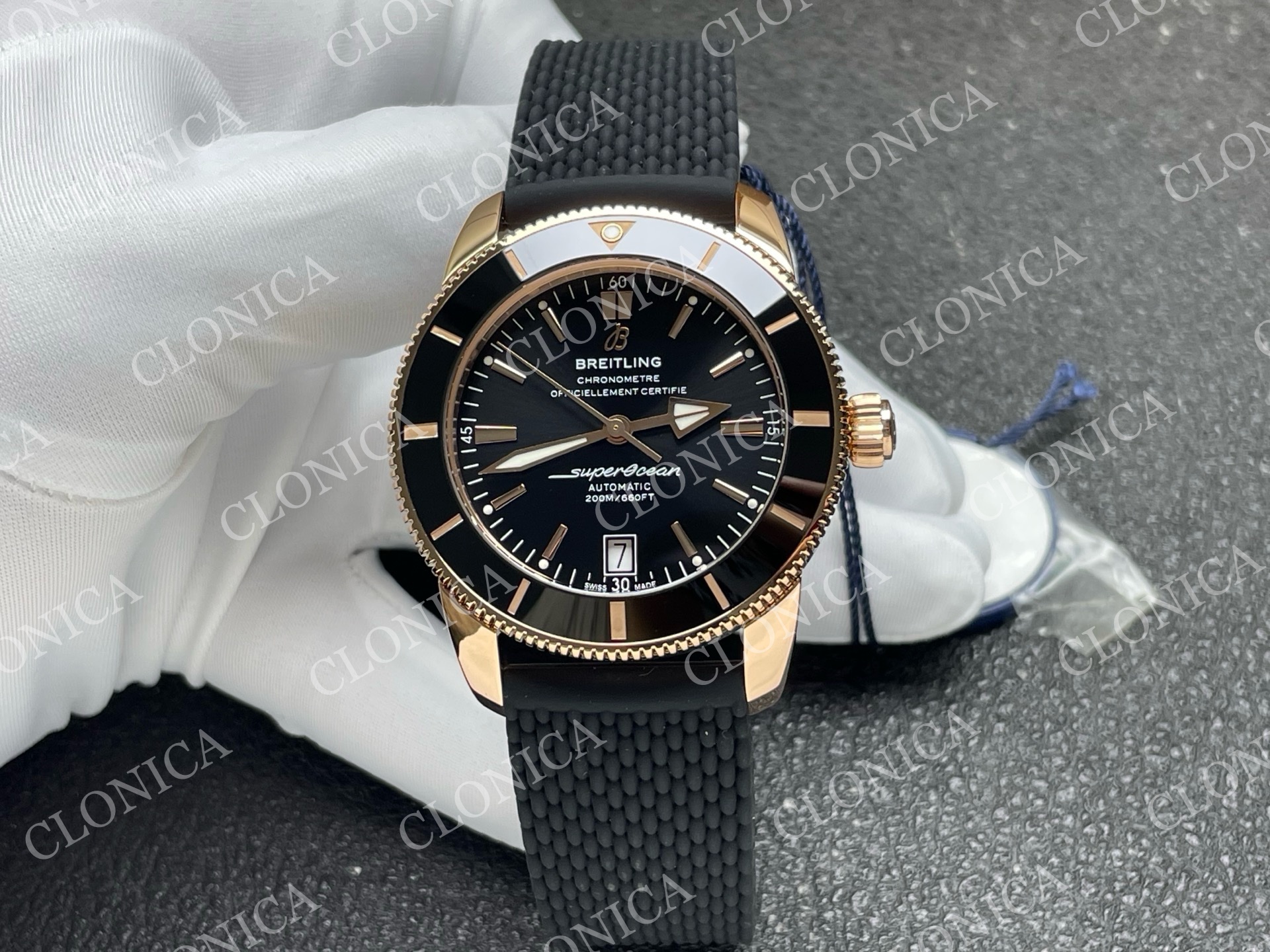 SUPEROCEAN 42MM AB2010 RG BLACK DIAL BLACK CERAMIC BEZEL ON BLACK RUBBER STRAP A2824