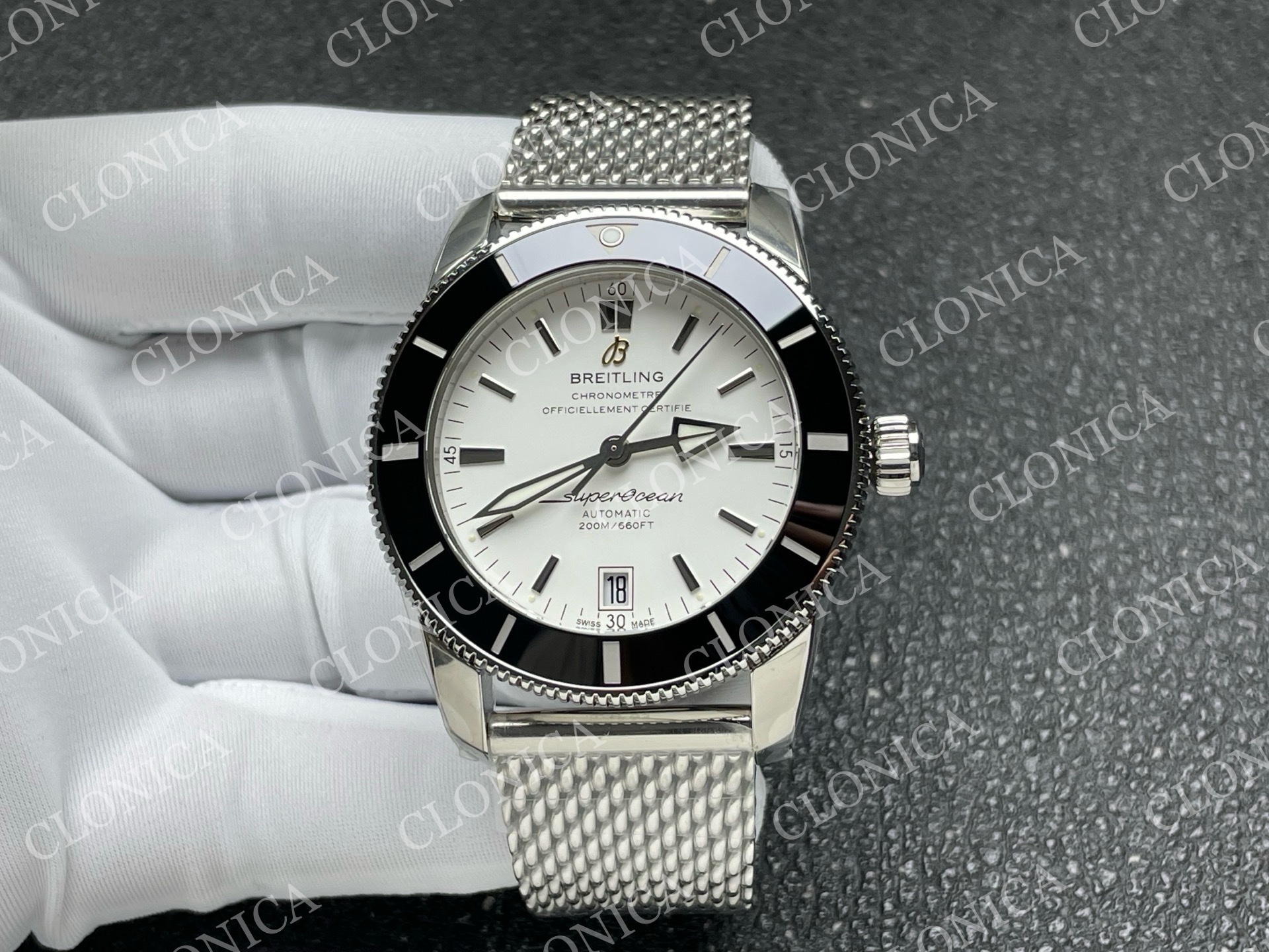 SUPEROCEAN 42MM AB2010 SS WHITE DIAL BLACK CERAMIC BEZEL ON SS BRACELET A2824