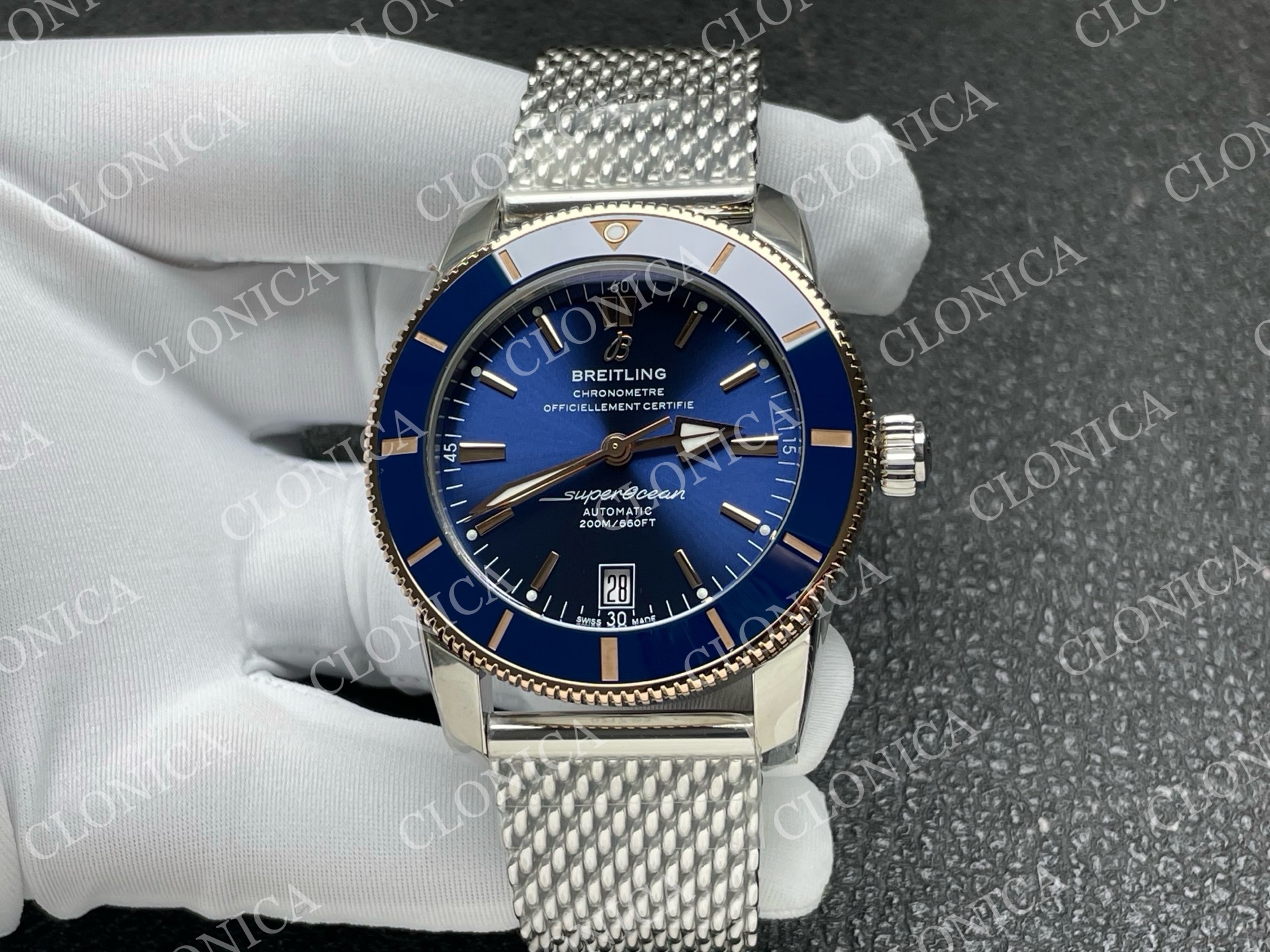 SUPEROCEAN 42MM AB2010 SS / RG BLUE DIAL BLUE CERAMIC BEZEL ON SS BRACELET A2824