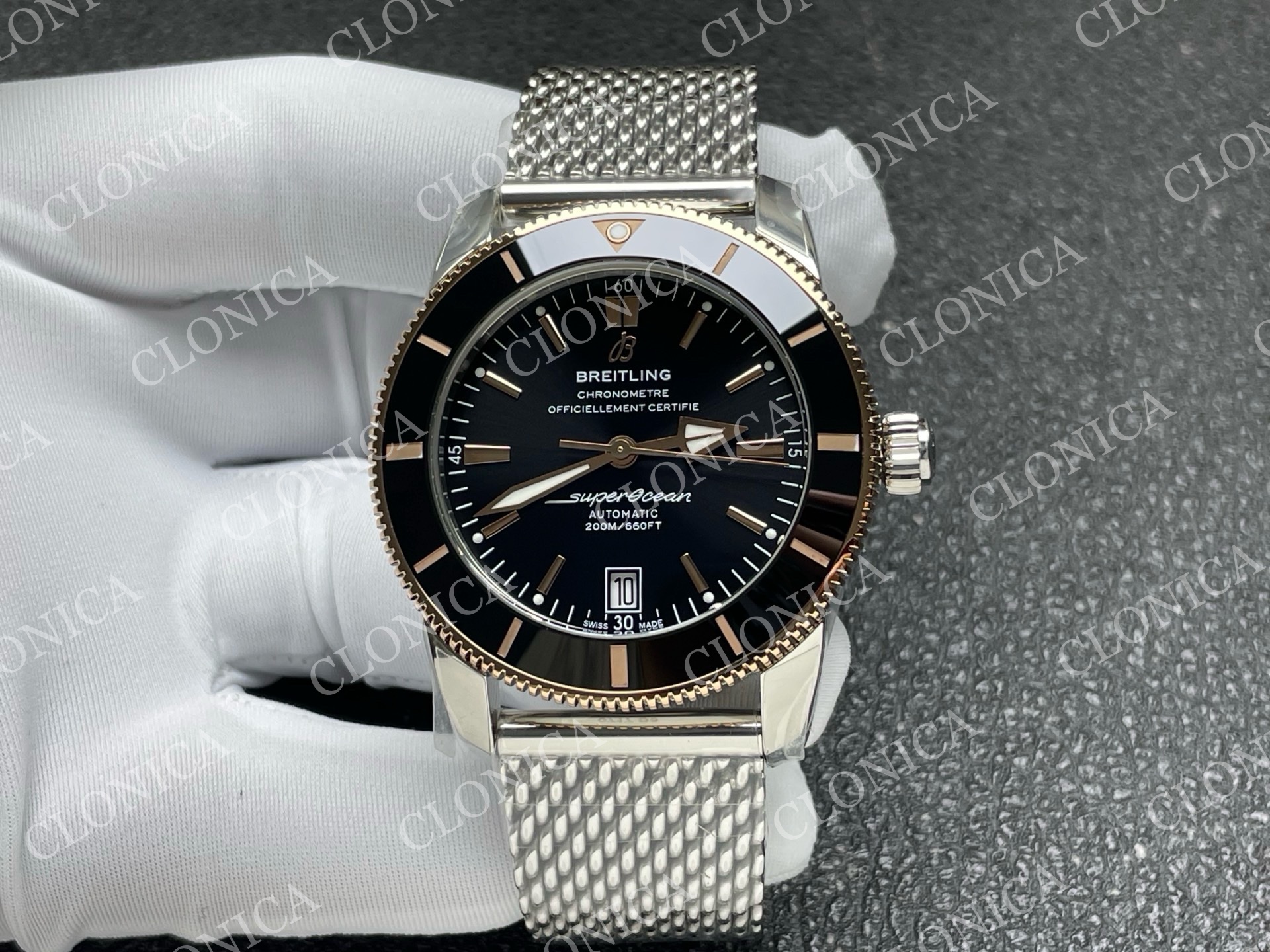 SUPEROCEAN 42MM AB2010 SS / RG BLACK DIAL BLACK CERAMIC BEZEL ON SS BRACELET A2824