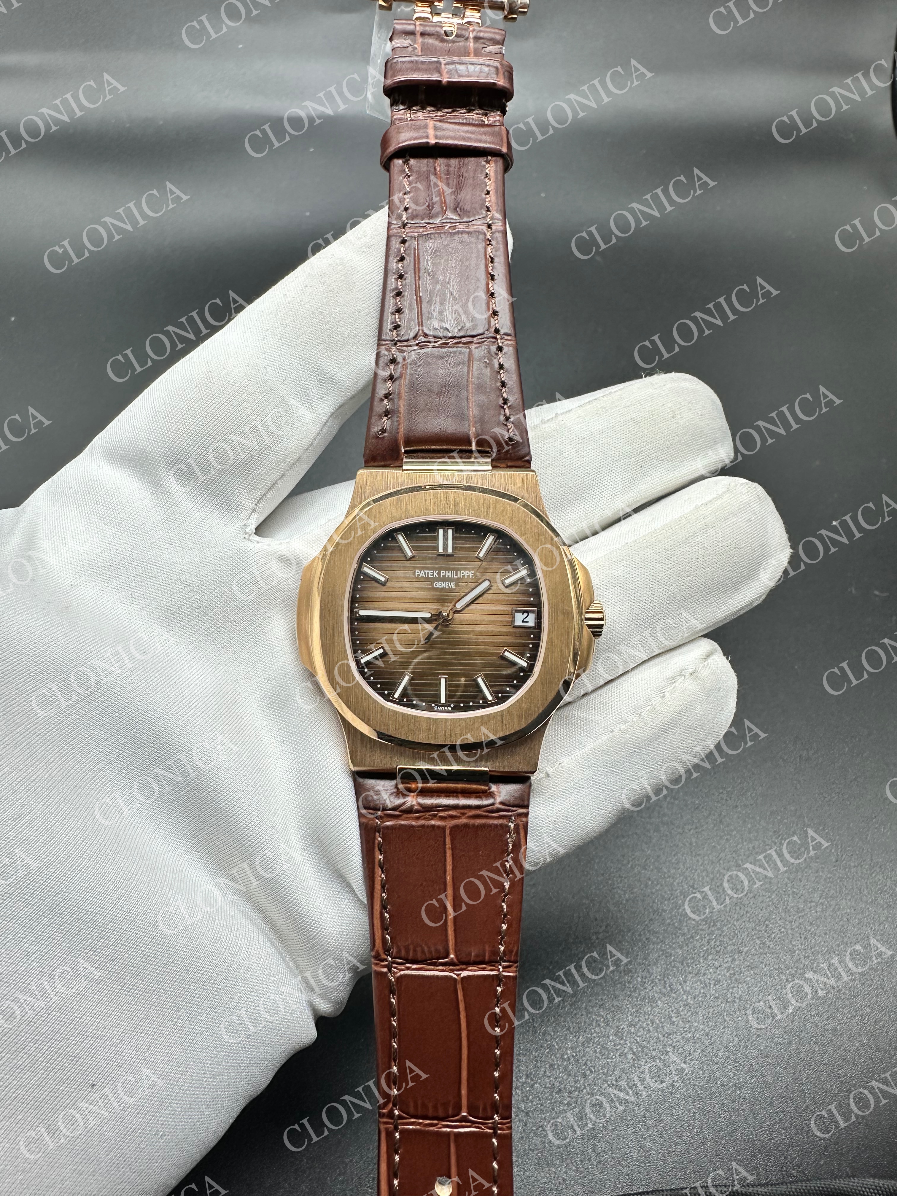 NAUTILUS 5711 BROWN TEXTURED DIAL ON BLACK LEATHER STRAP