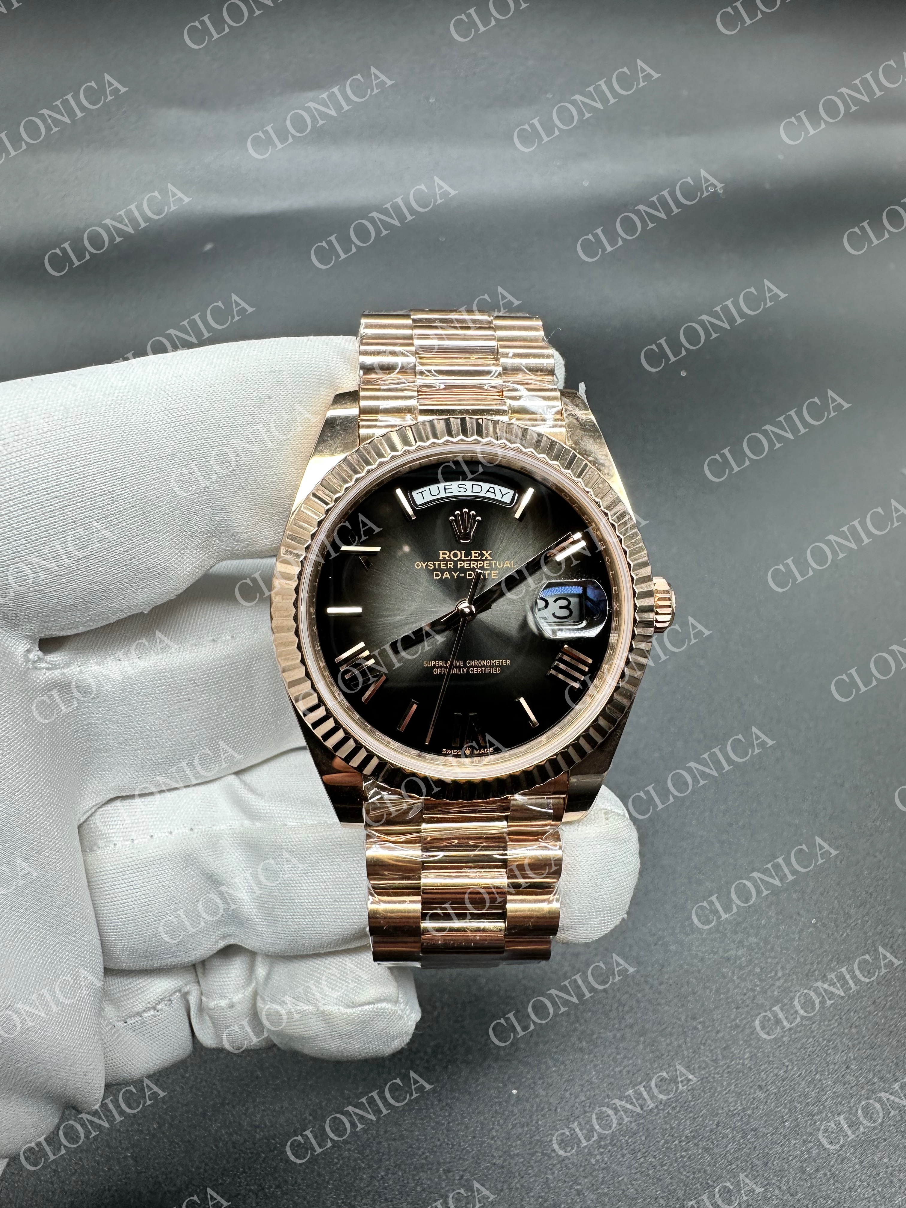 DAY DATE 128235 GAIN WEIGHT RG BLACK OMBRE DIAL ROMAN MARKERS ON RG PRESIDENT BRACELET